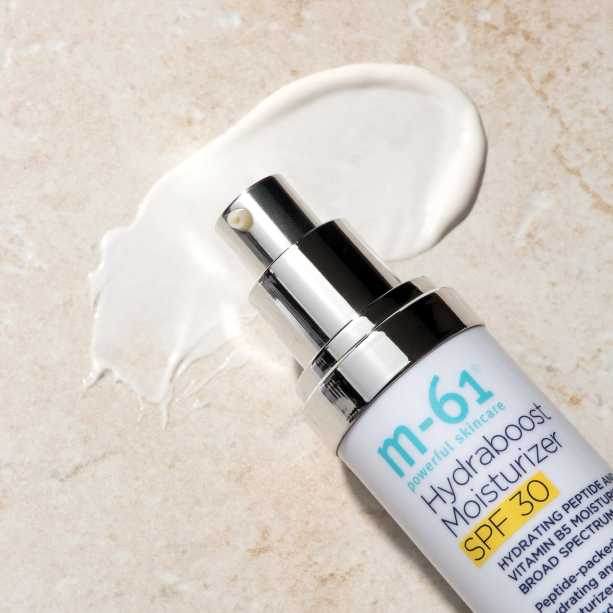 m-61 applied on hand illustrating fast-absorbing, non-greasy benefit