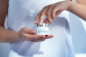 m-61 cream applied to hand, demonstrates smooth spreadability and hydration