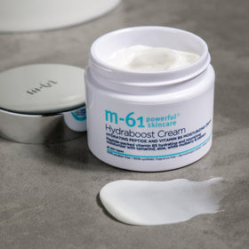 m-61 jar label highlighting peptides and vitamins, promotes firmer skin
