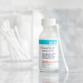 m-61 ingredient label close-up highlighting acids and botanical extracts for clarity