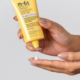 m-61 applied on model at beach showing reef-safe outdoor protection benefit
