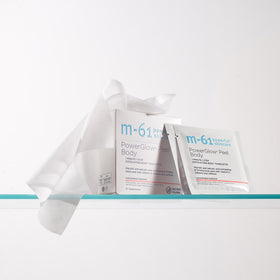 m-61 ingredients label featuring 15% glycolic and salicylic acids and botanicals