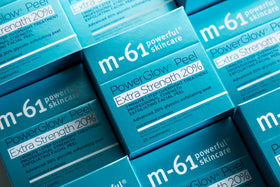 m-61 ingredients label close-up listing glycolic and salicylic acids and botanicals