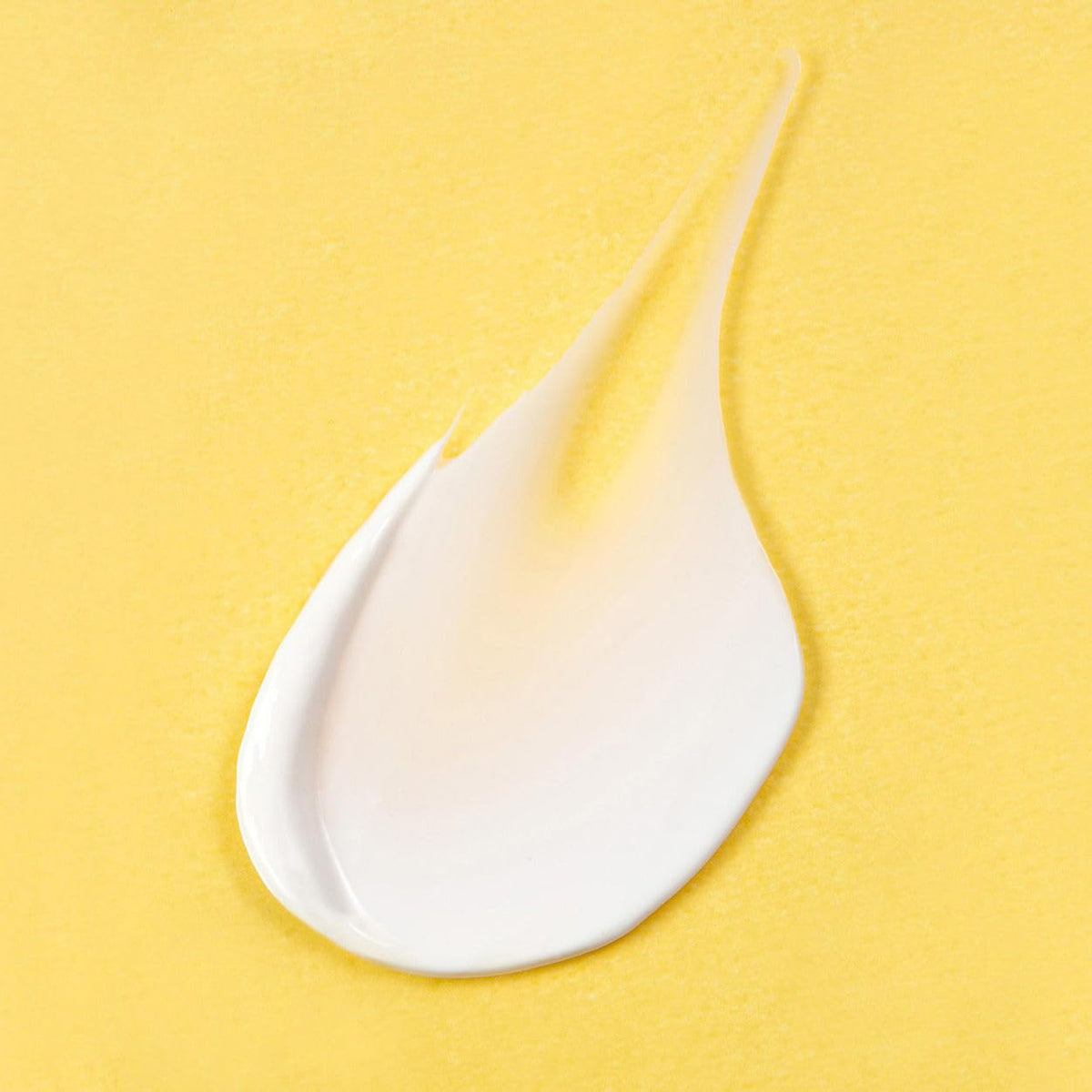 m-61 close-up texture of sunscreen highlighting smooth, blendable benefit