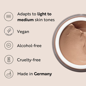 M. Asam blending mousse with a sponge to create natural skin-like finish