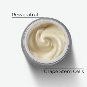 M. Asam jar open with cream visible to show nourishing formula and application readiness