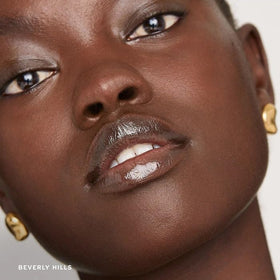 M Flush Balm applied on lips and cheeks showing multiuse natural glow benefit