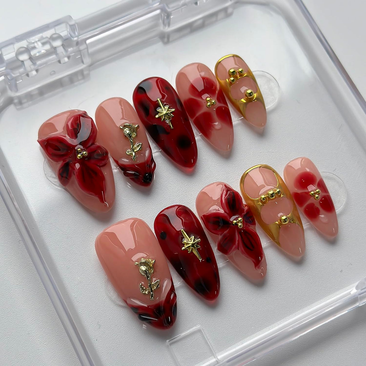 MABKJLF hand wearing nails to show finished glossy manicure