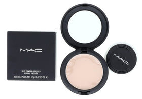 MAC blot powder medium close-up texture highlighting fine milled particles and smooth application benefit