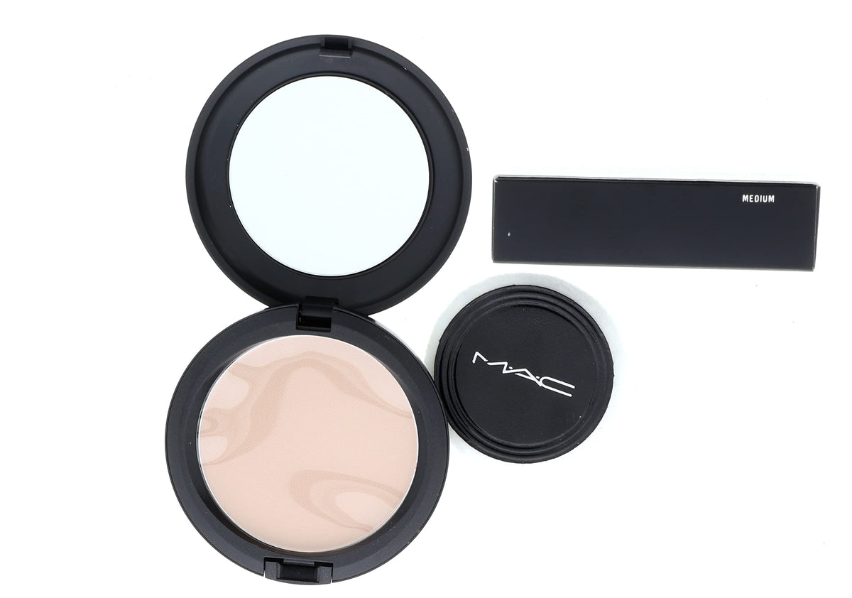 MAC blot powder medium in hand size comparison for portability and on-the-go touch-up benefit