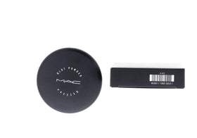 MAC blot powder medium lifestyle application patting T-zone to reduce shine and extend makeup wear benefit