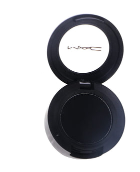 MAC carbon front pan showing compact matte black shade for intense pigment