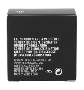 MAC Frost Vex next to ruler and packaging showing compact 0.05 oz size for travel convenience