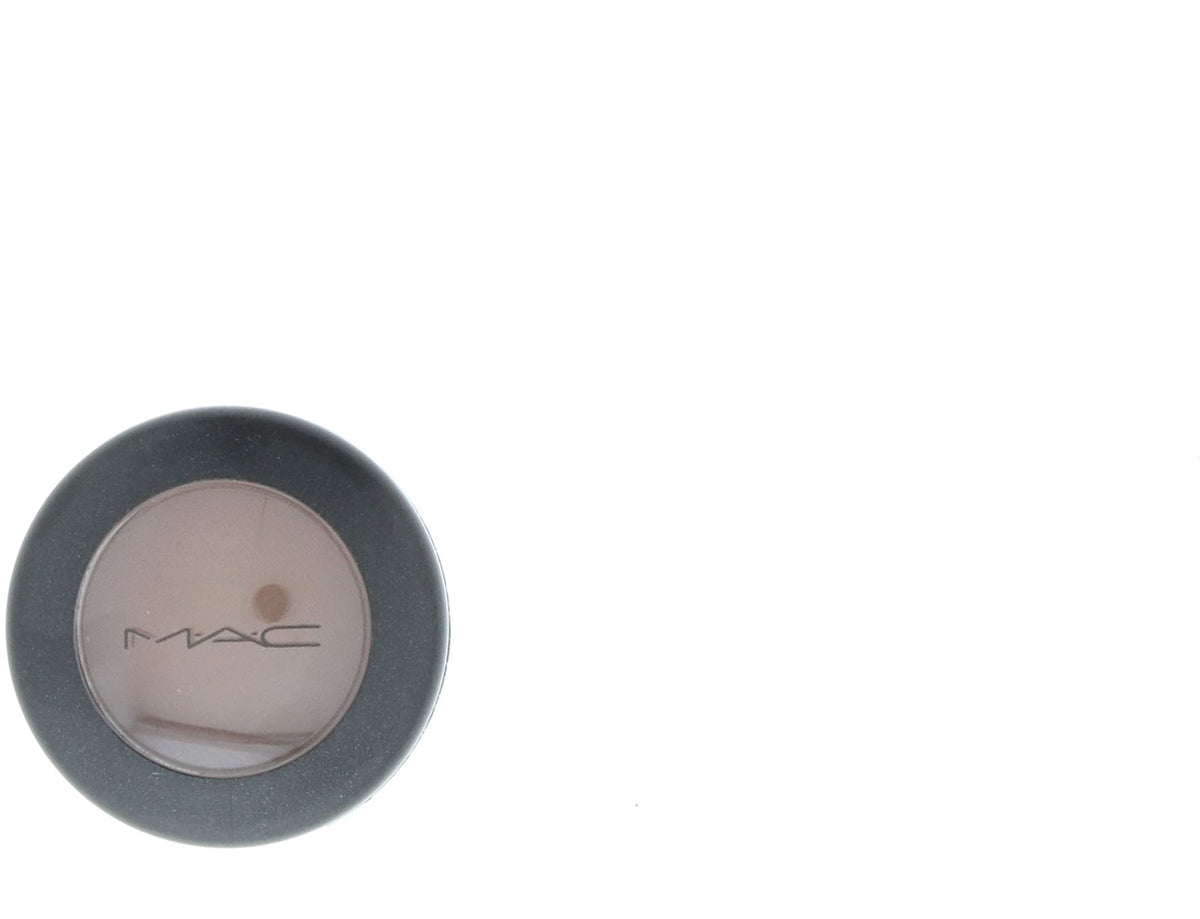 M·A·C front packaging of matte charcoal brown eye shadow showing compact benefit portability