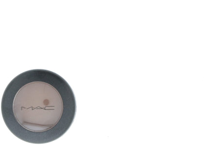 M·A·C front packaging of matte charcoal brown eye shadow showing compact benefit portability