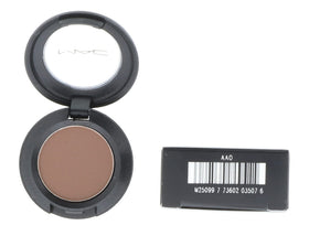 M·A·C swatches of matte charcoal brown on skin highlighting true pigment payoff