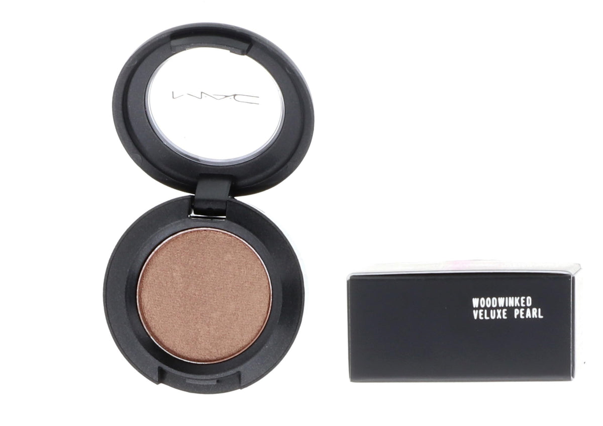 MAC Woodwinked front compact showing warm golden-bronze shade and packaging benefit
