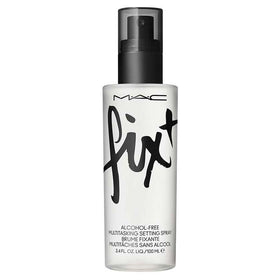 MAC Fixt ORIGINAL in use setting makeup on model for long-lasting wear benefit