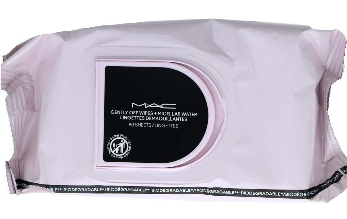 MAC wipe held in hand removing makeup showing effective cleansing action