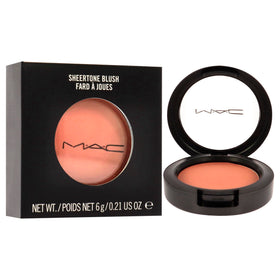 MAC Gingerly being applied with a fluffy brush demonstrating buildable color and natural cheek contouring