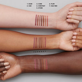 MAC lip pencil on vanity with other cosmetics showing everyday styling versatility