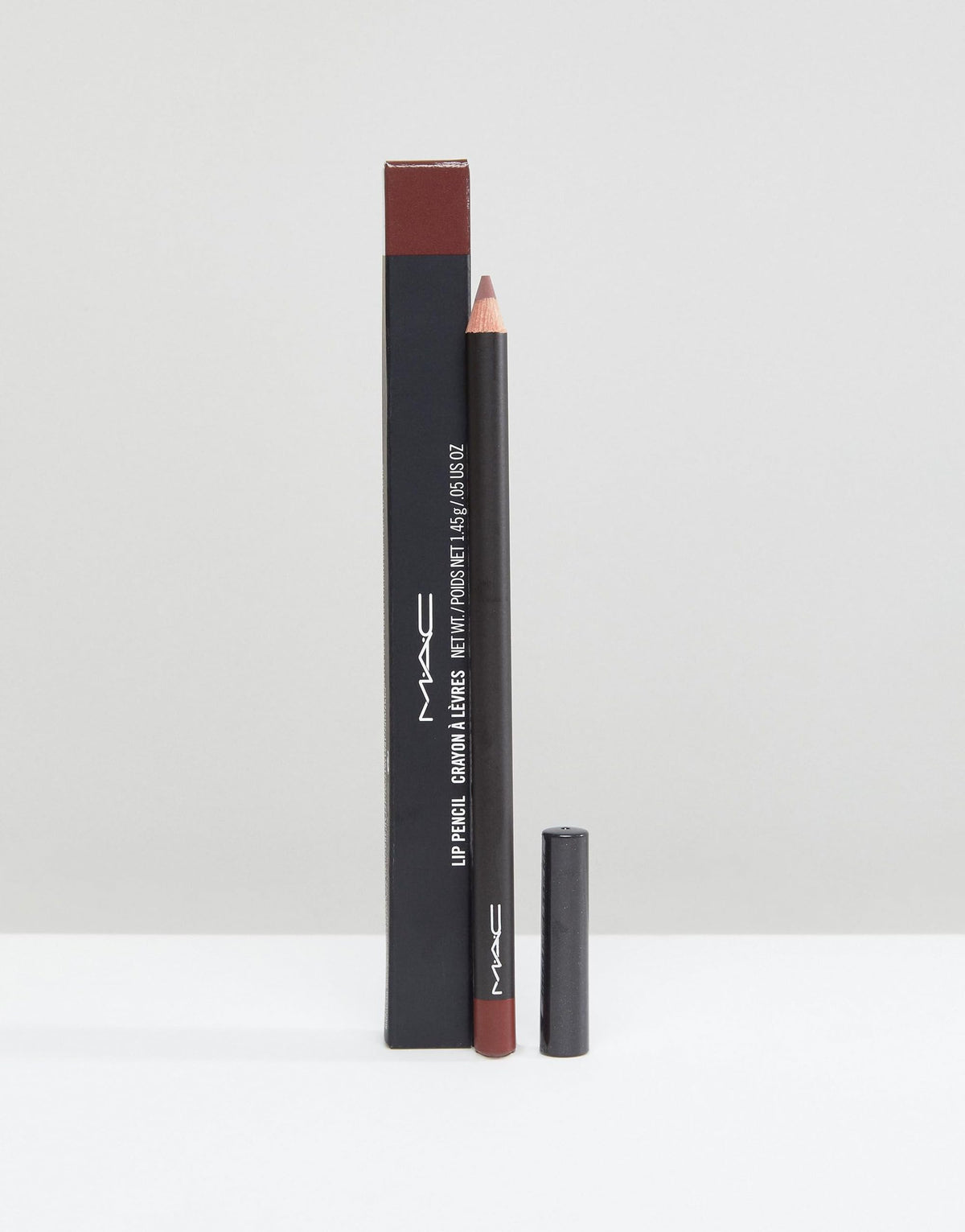 MAC lip pencil Mahogany sharpened tip close-up illustrating accurate lining