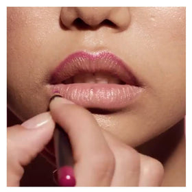 MAC lip pencil Whirl held in hand showing size and travel-friendly benefit