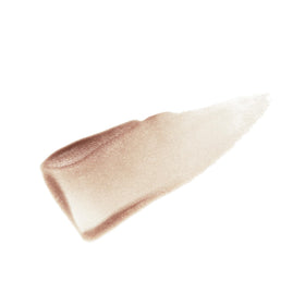 MAC Lipglass on model lips illustrating sheer nude glow and enhanced radiance benefit