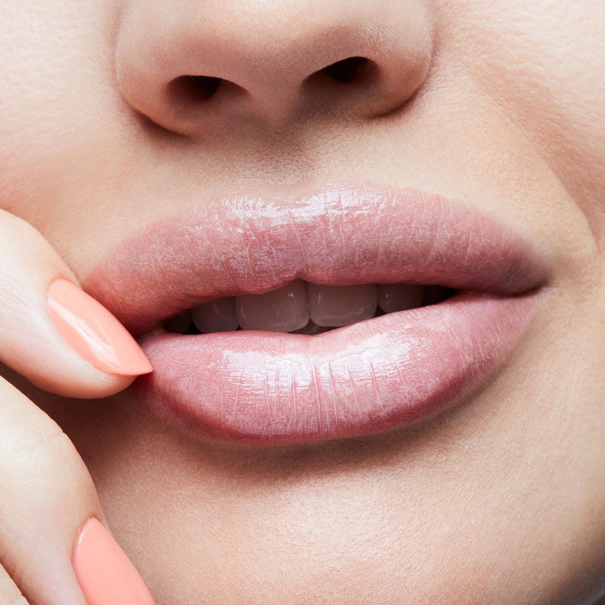 MAC Lipglass texture close-up showing glossy finish and smooth formula benefit