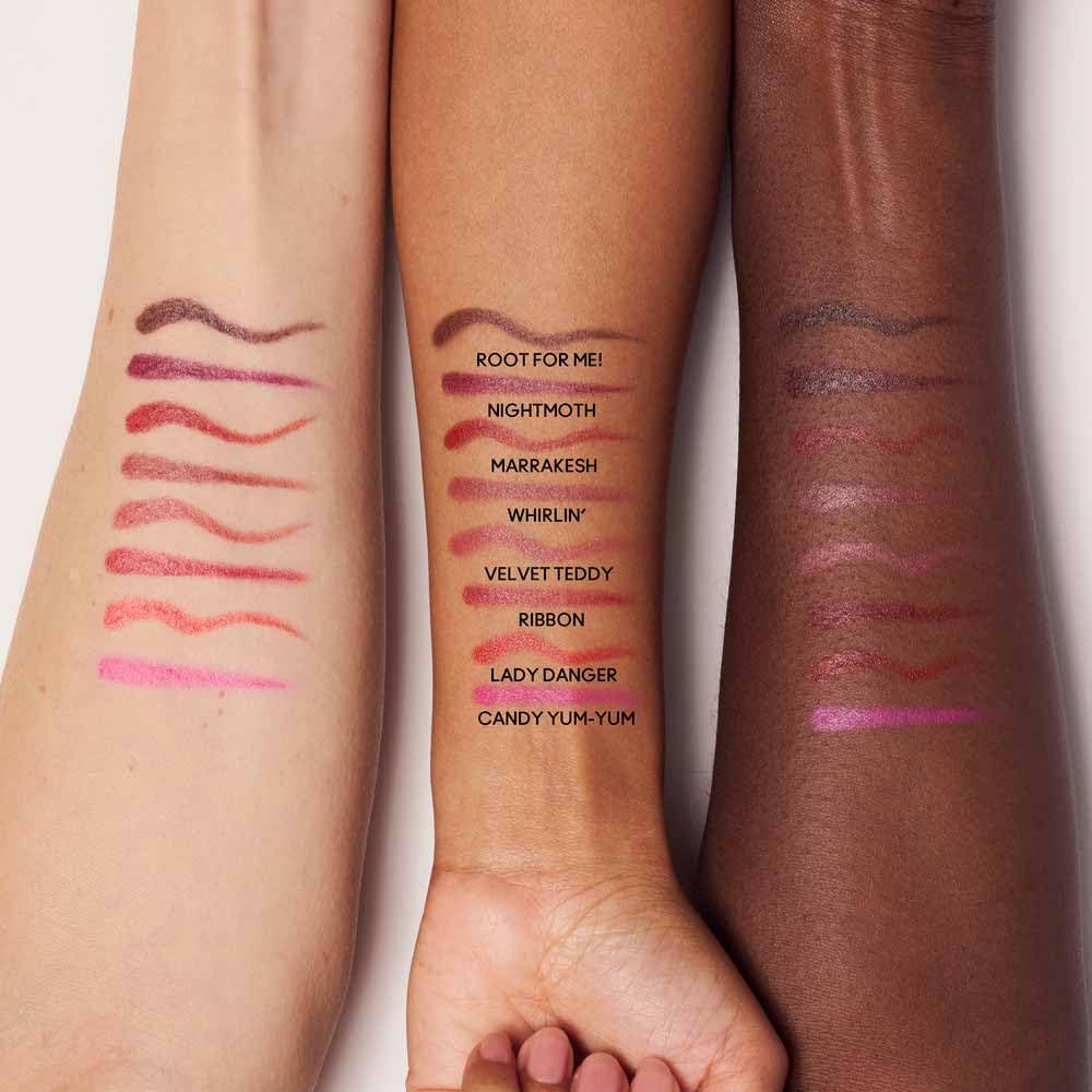 MAC Lipglazer Velvet Teddy beside coin shows compact size for portability