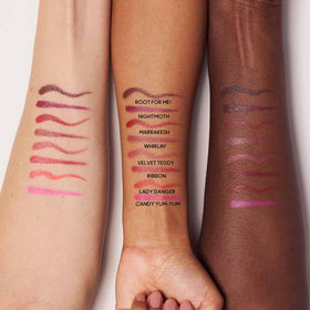 MAC Lipglazer Velvet Teddy beside coin shows compact size for portability