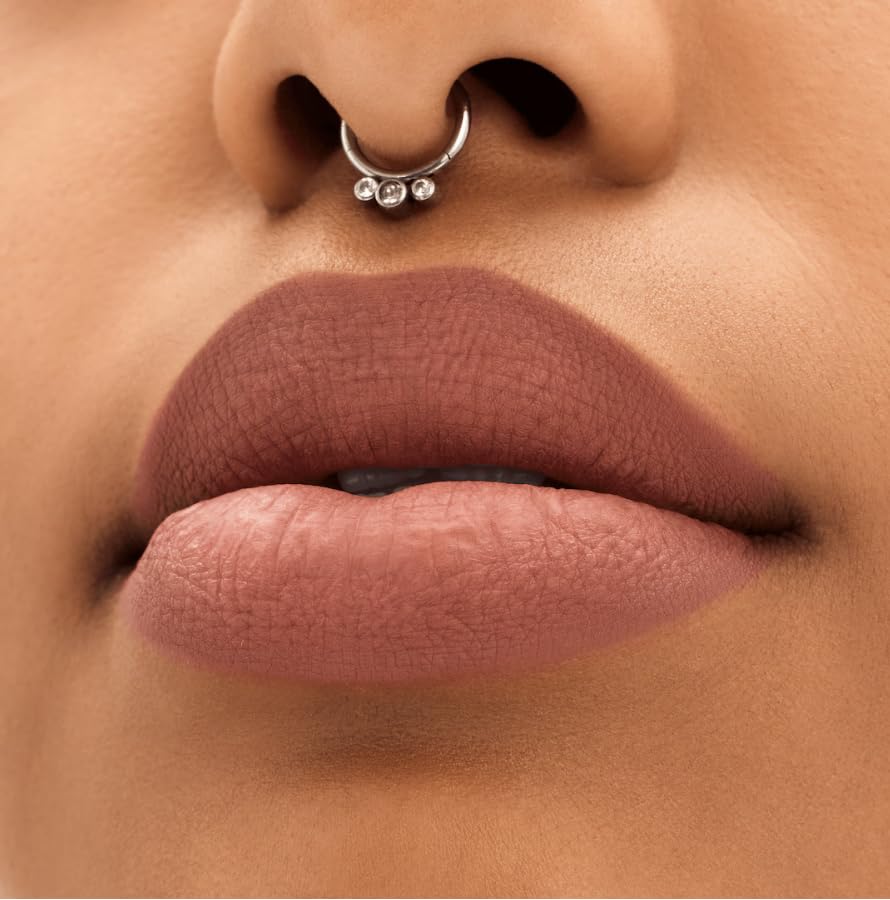 MAC Locked Kiss on lips lifestyle shot showing MAC color longevity and polished look