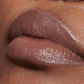 MAC lipstick applied on model lips demonstrating smooth satin finish and coverage