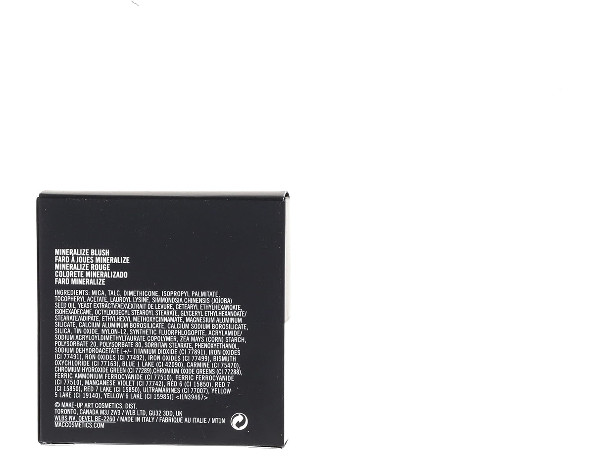 MAC mineralize blush lifestyle flatlay with brush showing everyday usability benefit