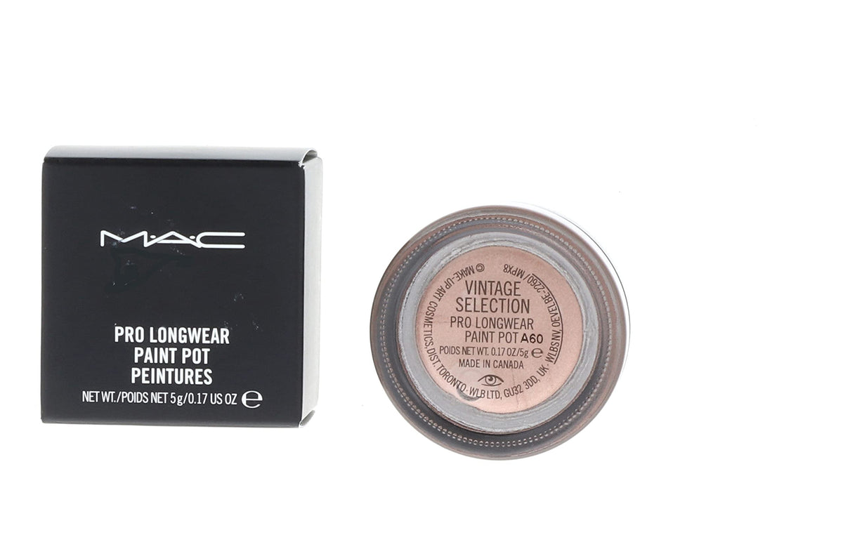 MAC paint pot next to palette showing coordination with powder shadows