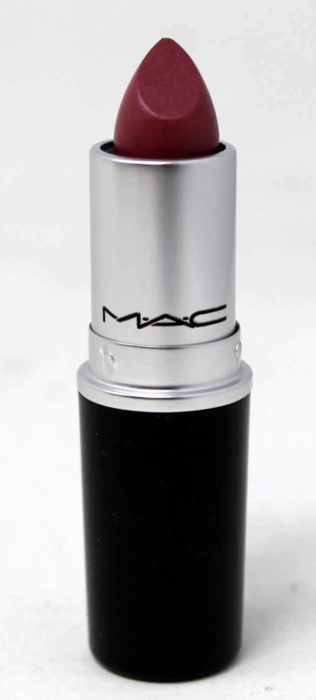 MAC plum Syrup texture closeup on skin highlighting glossy finish and smooth application