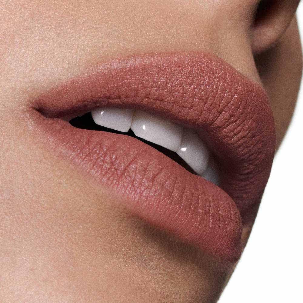 MAC swatch of 952 Taken on arm, demonstrates true warm light brown tone