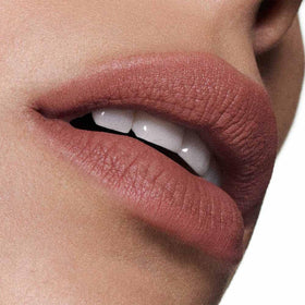 MAC swatch of 952 Taken on arm, demonstrates true warm light brown tone