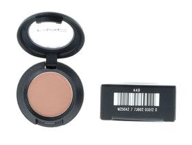 MAC Soft Brown beside makeup bag showing travel-friendly everyday use