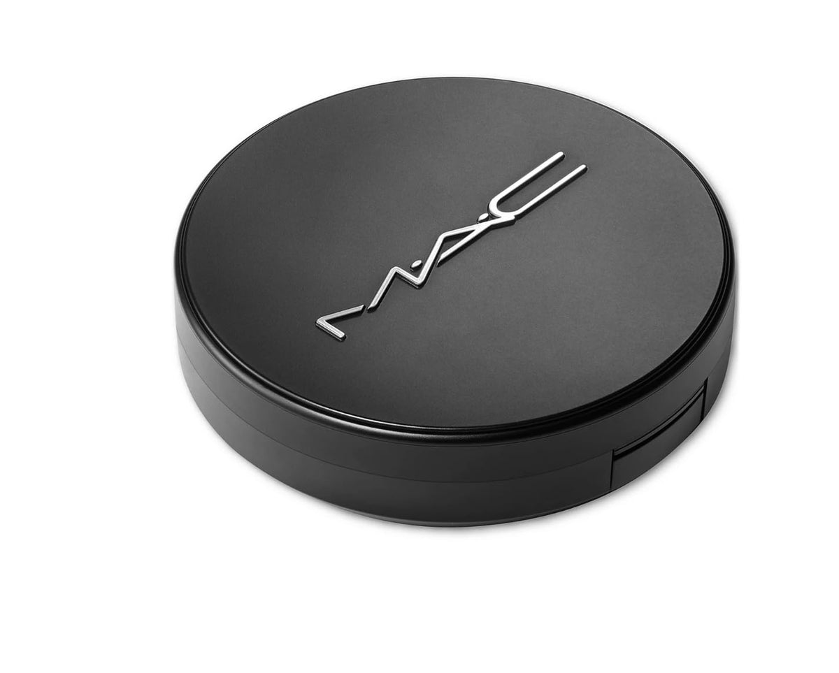 MAC applying powder with sponge showing buildable coverage and control