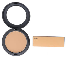 MAC Studio Fix compact in makeup bag illustrating portability for travel