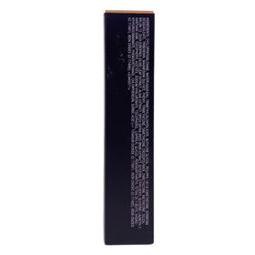 MAC Studio Fix concealer in use application under eye with fingertip for natural-looking coverage and longevity