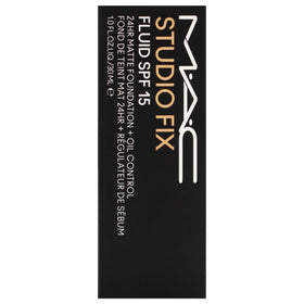 MAC Studio Fix Fluid NC25 being applied with brush demonstrating even finish benefit