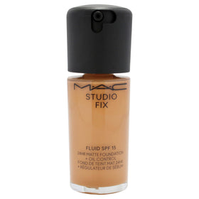 MAC studio fix fluid pump and label detail highlighting shade NC45 and usage convenience