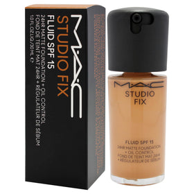 MAC studio fix fluid swatch on arm showing NC45 warm-deep tone for shade matching