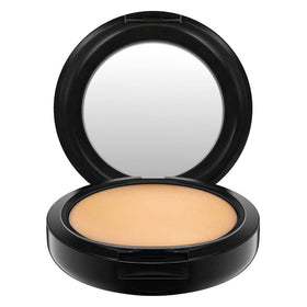 MAC powder being applied with a sponge demonstrating easy layering and control