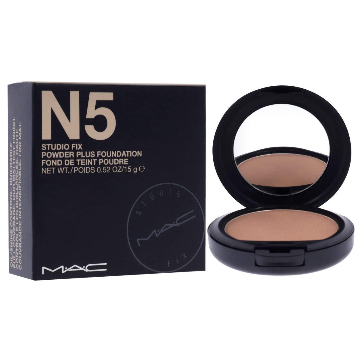 MAC brush applying Studio Fix N5 swatch demonstrating blendability and buildable coverage