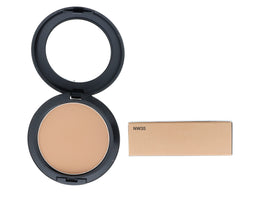 MAC open pan close-up revealing powder texture and buildable coverage benefit