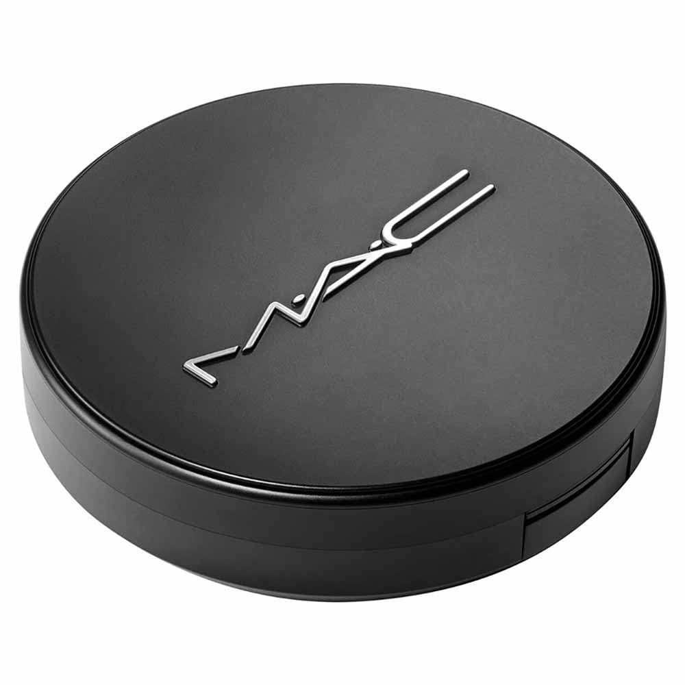 MAC application close-up demonstrating buildable coverage effect