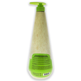 Macadamia Natural Oil pump dispensing creamy conditioner, detail shows smooth nourishing texture